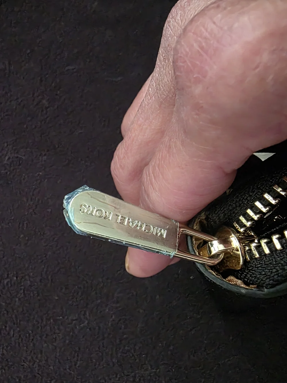 Michael Kors around zipper gold